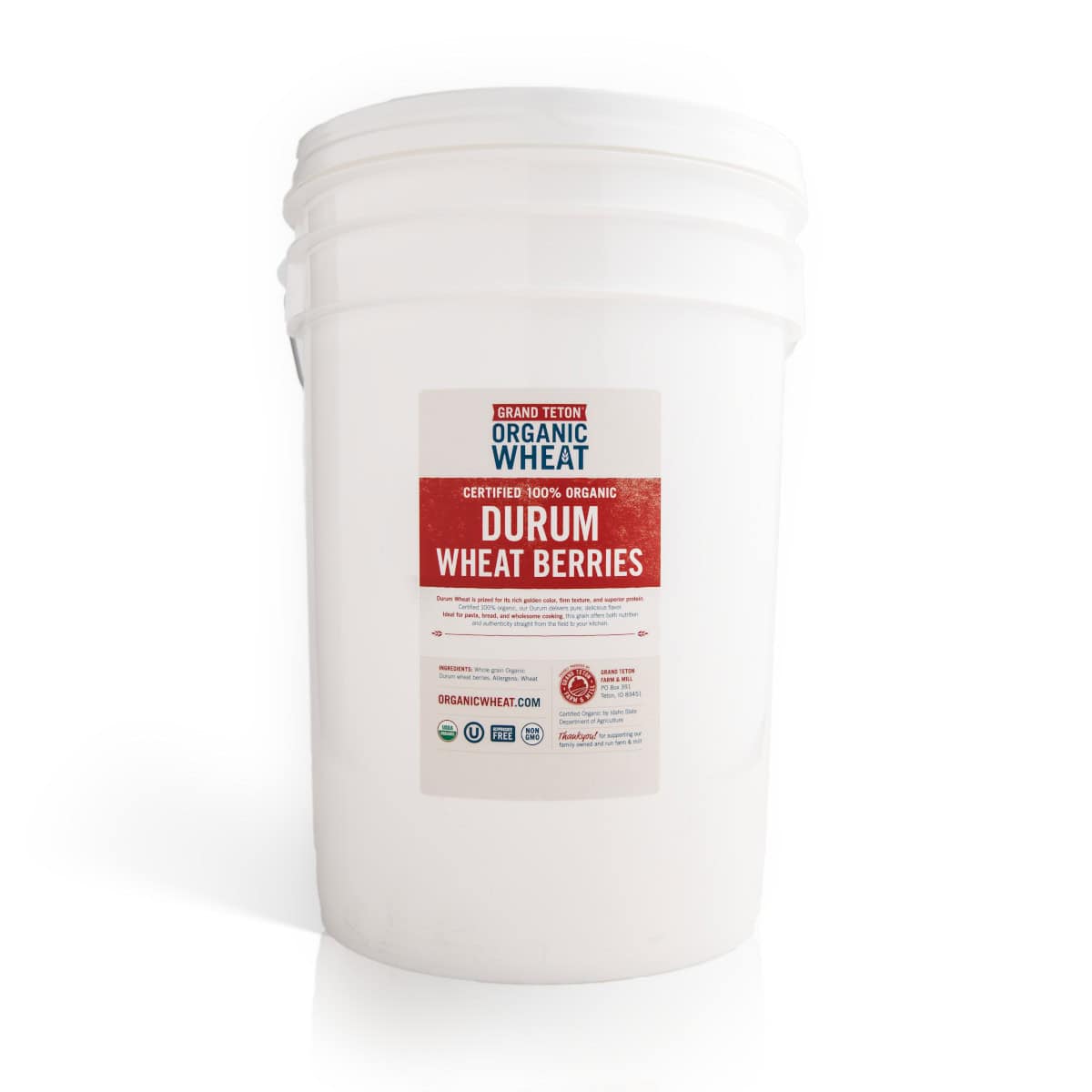 White 6 gallon Super Pail of Grand Teton Organic Durum Wheat Berries with a sealed lid and product label on a white background